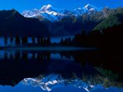 Lake-Matheson-Reflects-Mount-Tasman-and-Mount-Cook New-Zealand
